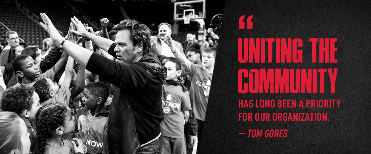 Photo of Pistons Owner Tom Gores with the quote 'Uniting the community has long been a priority for our organization.' – Tom Gores